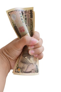 Yen, Japon para birimi üzerinde izole demet tutan kadın el 