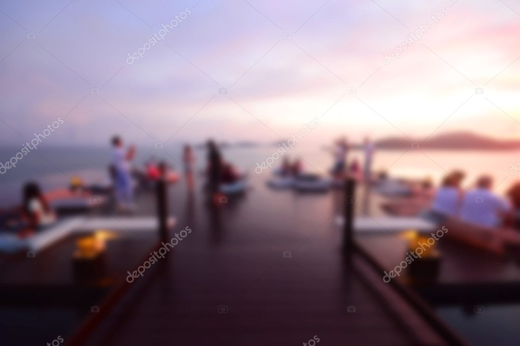 Abstract blur People watching sunset