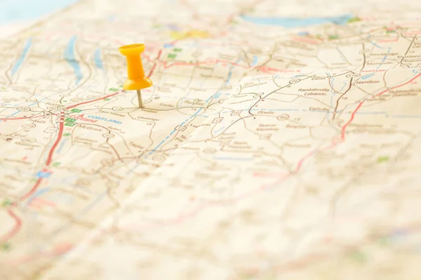Yellow Pin Pressed Map Detailing Point Interest — Stock Photo, Image