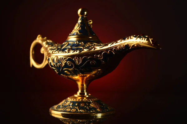 Magical Ornate Brass Oil Lamp Atmospheric Red Black Gradient Background — Stock Photo, Image