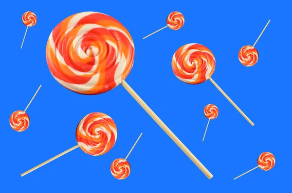 Colorful Lollipops Background Many Candy Flying Frame Blue Color — Stock Photo, Image
