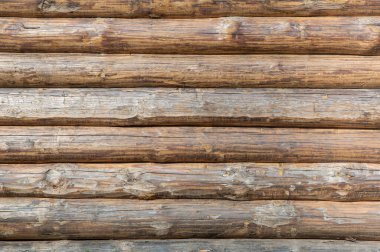 paralel olarak istiflenmiş yatay günlüklerden tahta arkaplan