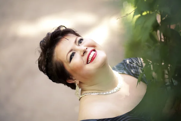 Gordito mujer sonriendo — Foto de Stock