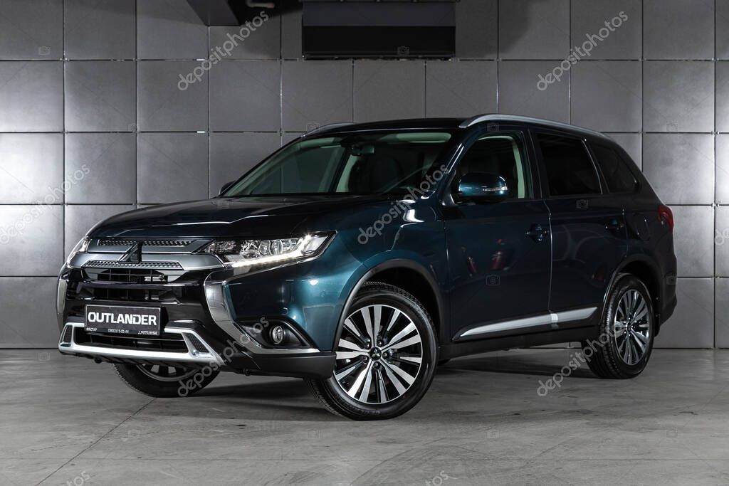 Novosibirsk, Russia  October 26, 2020:   blue Mitsubishi Outlander, front  view.  Photography of a modern crossover made in Japan on a parking