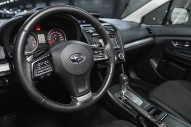 Novosibirsk, Russia  November 16, 2020: Subaru XV, cockpit interior cabin details, speedometer and tachometer. Black leather interior 