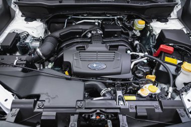 Novosibirsk, Russia  November 16, 2020: Subaru Forester, Under the hood of car. Powerful engine closeup. Clean motor block 