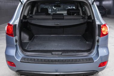 Novosibirsk, Russia  November 26, 2020: Hyundai Santa Fe , Clean, open empty trunk in the car SUV  clipart