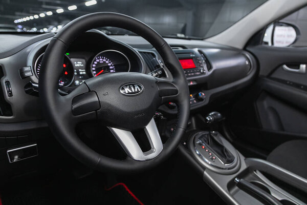 Novosibirsk, Russia  December 17, 2020:  Kia Sportage, Luxurious car interior - steering wheel, shift lever and dashboard  