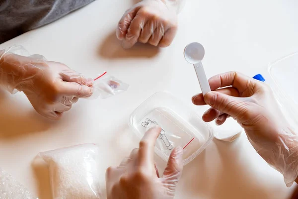 Little Boy His Mother Laying Out Test Tubes Objects Table — Stock Photo, Image