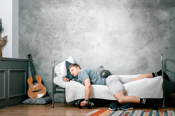 Athlete Lounging Resting Dumbbells Postponing Training Home Concept Proastination Sports — Stock Photo, Image