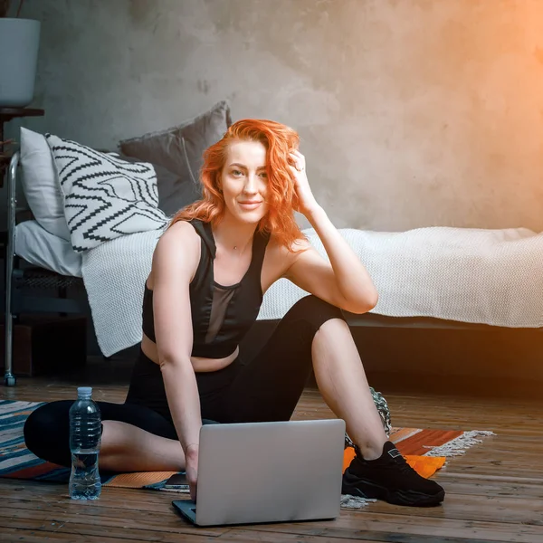 Close Young Woman Sports Uniform Resting Floor Home Watches Movie — Stock Photo, Image