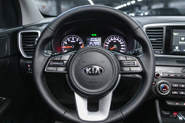 Novosibirsk, Russia  February 18 2021: Kia Sportage, Luxurious car interior - steering wheel, shift lever and dashboard 