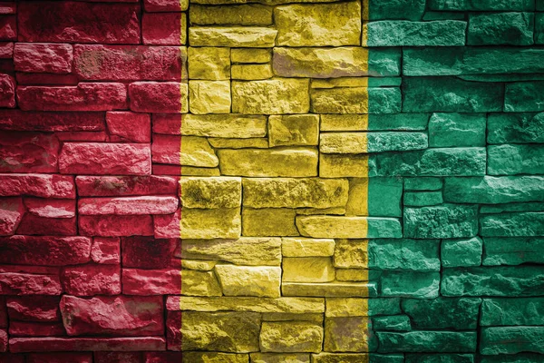 중국의 돌벽에 기니의 국가의 자부심 국가의 상징이라는 텍스처 세워져 — 스톡 사진