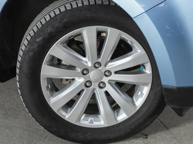 Novosibirsk, Russia - May 29, 2021: Subaru Forester, close-up car wheel with aluminum alloy wheel and new tire clipart