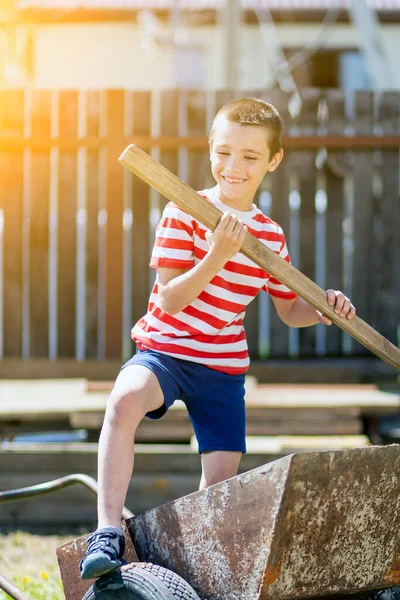 Little Cheerful Boy Stands Garden Wheelbarrow Holds Shovel His Hand — Stock Photo, Image