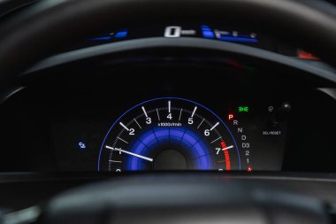 Novosibirsk, Russia - June 08, 2021: Honda Civic, Speedometer, tachometer and steering whee clipart