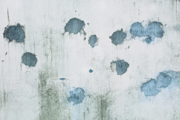Splodgy fundo de parede cinza com manchas azuis — Fotografia de Stock