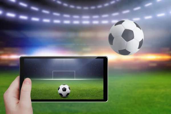 Tablet in hand, soccer stadium — Stock Photo, Image