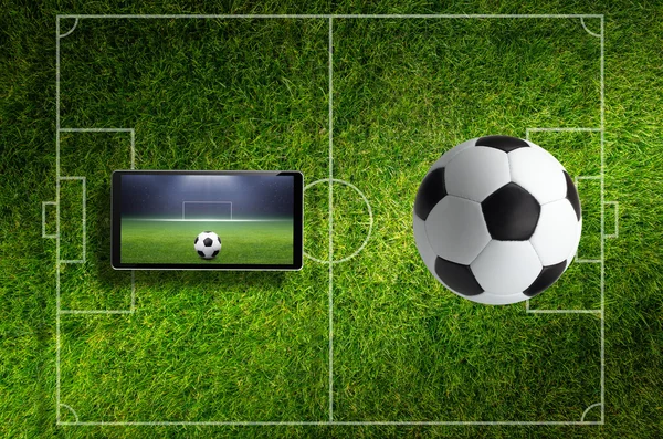 Soccer collage with ball, field and tablet pc — Stock Photo, Image