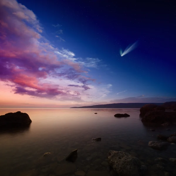 Kometa v západu slunce obloha — Stock fotografie