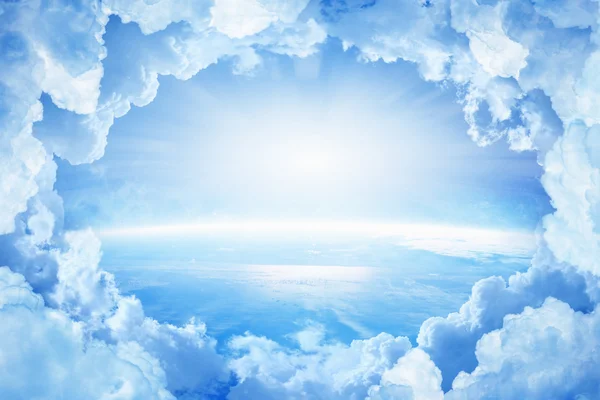 Planet Earth in white clouds — Stock Photo, Image