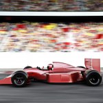 Motor sports red race car angled view speeding down the track leading ...
