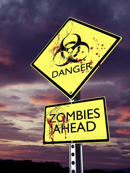 Danger Zombies ahead weathered bio hazard warning sign with blood. — Stok fotoğraf