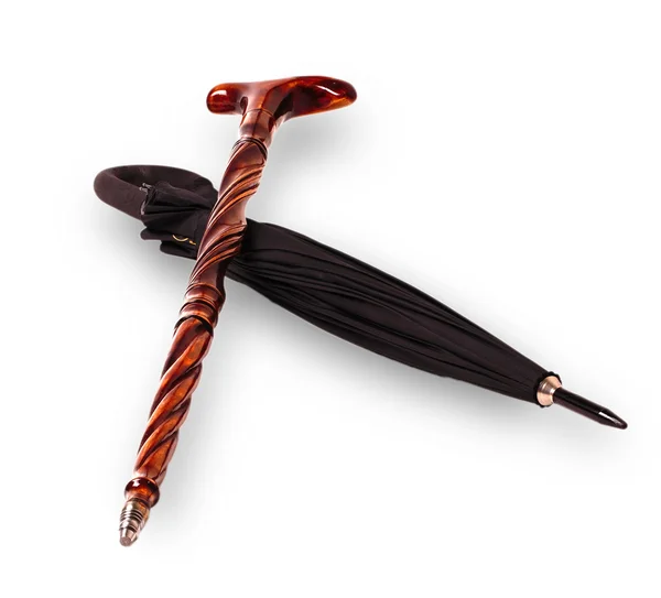 Drewniane trzciny i czarny parasol — Zdjęcie stockowe