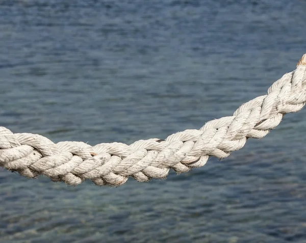 Maritime white rope on the background of the se — Stock Photo, Image