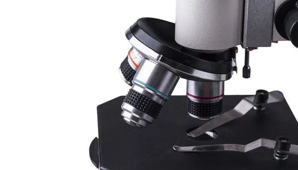白い背景に分離された顕微鏡の対物レンズ — ストック写真