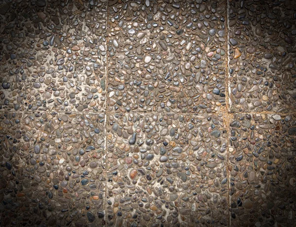 Grondsteen gewassen vloer, gemaakt van kleine zandsteen in licht — Stockfoto