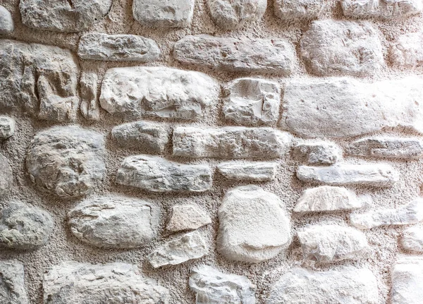 흰 벽돌 벽을 가까이 닫고, 배경으로 흰 석조 물의 질감 — 스톡 사진