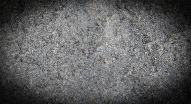 Koyu gri siyah taş arka plan veya doku. Seçici odak