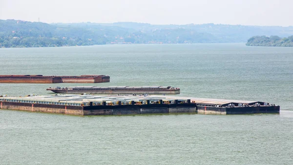 barge transports cargo on the river. Selective focus