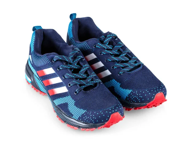 Blue Adidas Running Sneakers Adidas, німецька компанія. Ізольовані на білому. — стокове фото