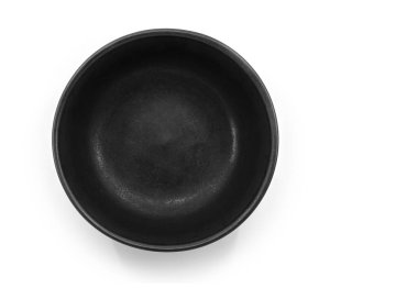 Beautiful black bowl on white background, top view image, matt color, round shape, inside empty.