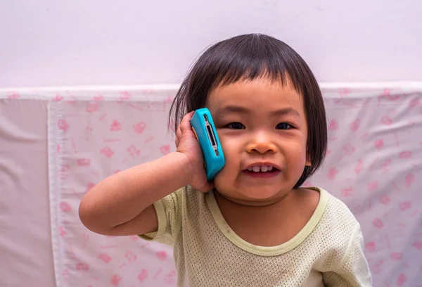 Toddler girl and cell phone — Stock Photo, Image