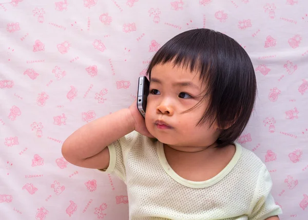 Toddler girl and cell phone — Stock Photo, Image