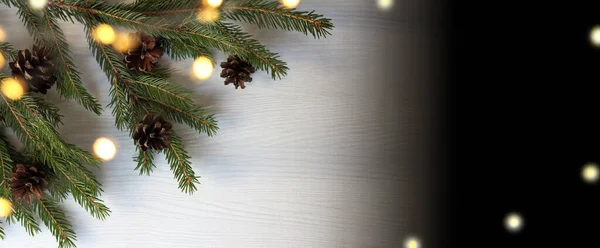コーンとガーランドライトのクリスマスツリーの枝 長い休日のバナー — ストック写真
