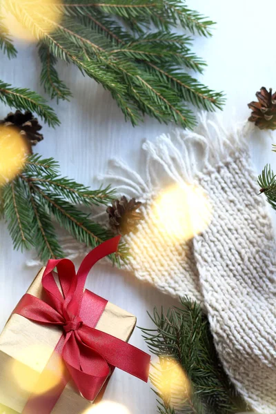 Christmas Gift Fir Branches Cones Knitted White Scarf Blurry Garland — Stock Photo, Image