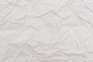 Beyaz buruşmuş kağıt dokusu. Arkaplan için soyut kağıt deseni. Resmi kapat..