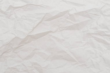 Beyaz buruşmuş kağıt dokusu. Arkaplan için soyut kağıt deseni. Resmi kapat..