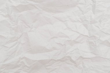 Beyaz buruşmuş kağıt dokusu. Arkaplan için soyut kağıt deseni. Resmi kapat..