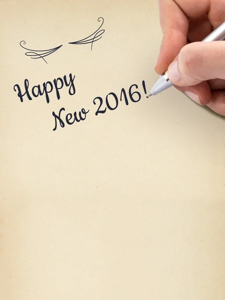 Escritura a mano "Feliz Nuevo 2016!" sobre hoja de papel envejecida . —  Fotos de Stock