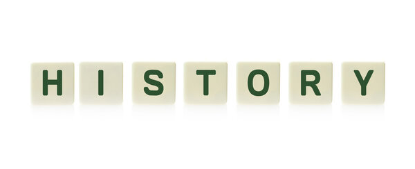 Word "History" on board game square plastic tile pieces, isolated on a white background.