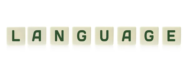 Parola "Lingua", pezzi di piastrelle di plastica quadrata gioco da tavolo, isolato su uno sfondo bianco . — Foto Stock