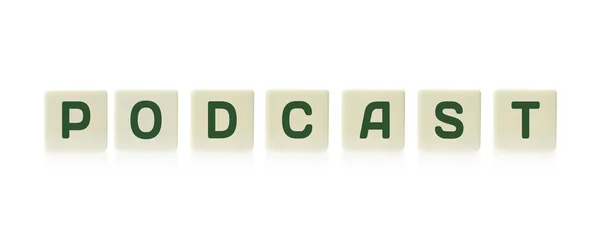 Word "Podcast" on board game square plastic tile pieces, isolated on a white background. — Stock Photo, Image