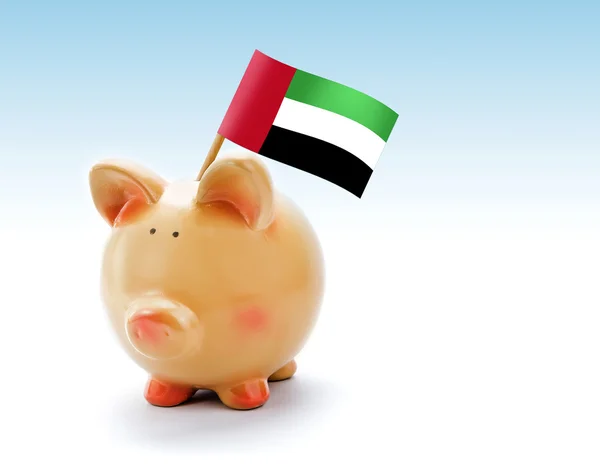 Piggy bank az Egyesült Arab Emírségek zászlaja — Stock Fotó