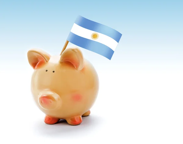 Piggy bank met nationale vlag van Argentinië — Stockfoto