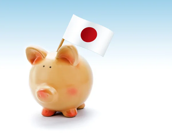 Банк свиней с национальным флагом Японии — стоковое фото